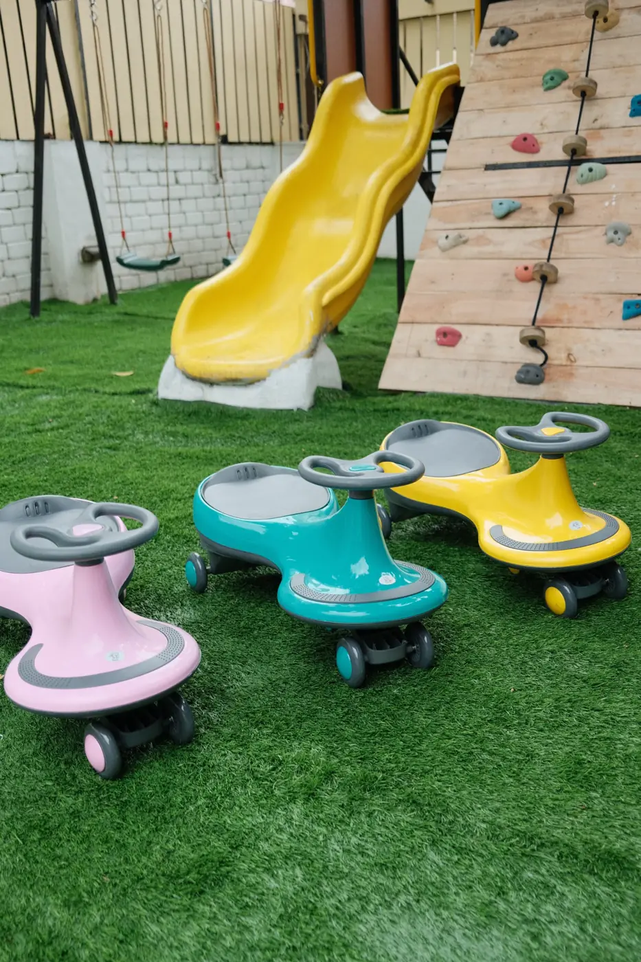 Ride-on cars on the lawn